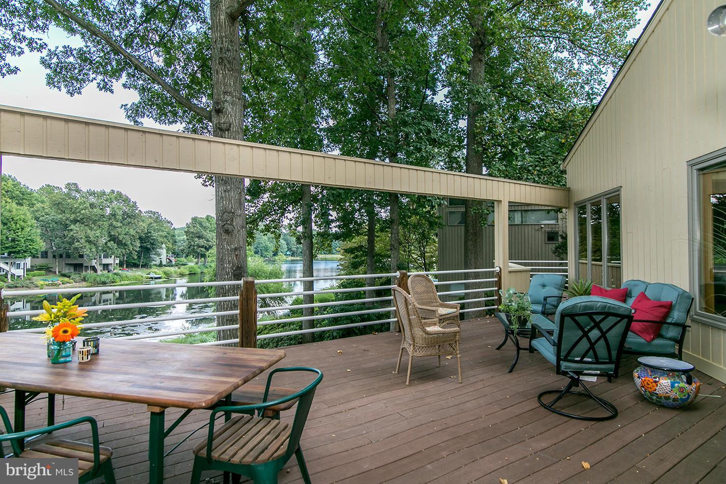 11580 Lake Newport Road Reston, VA 20194 - Photo 29 of 30 a balcony with furniture and wooden floor