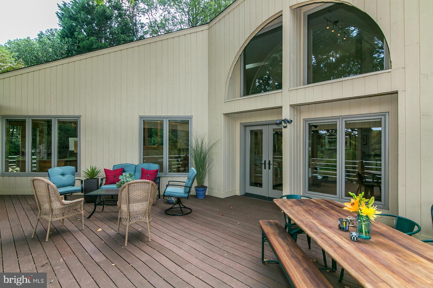 11580 Lake Newport Road Reston, VA 20194 - Photo 6 of 30 a house view with a seating space and garden space