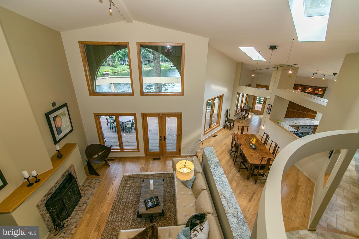 11580 Lake Newport Road Reston, VA 20194 - Photo 8 of 30 a view of a living room with furniture and a mirror