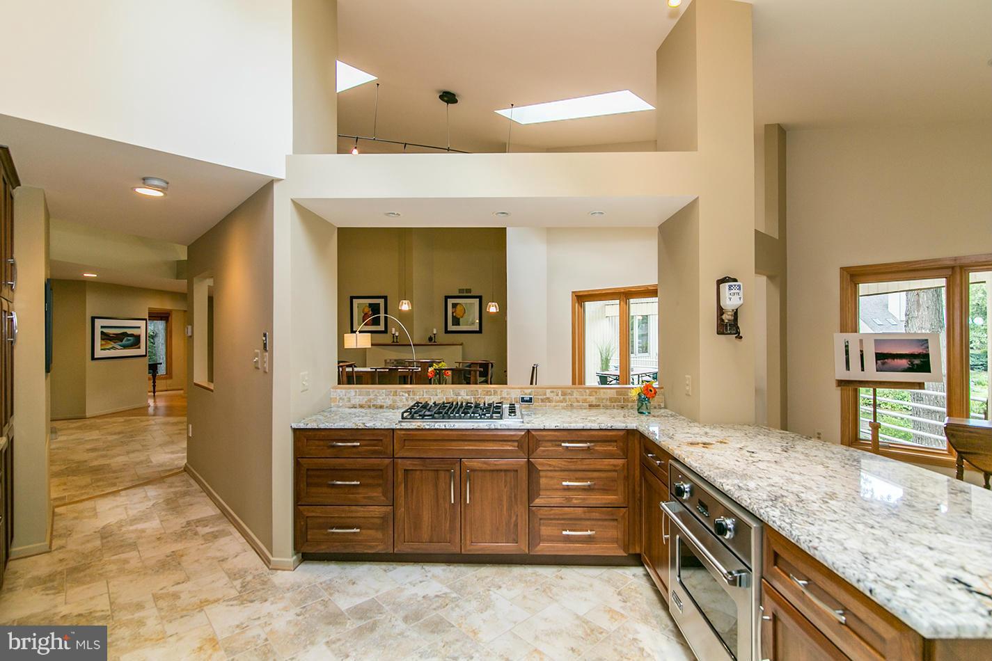 11580 Lake Newport Road Reston, VA 20194 - Photo 10 of 30 a spacious bathroom with a granite countertop sink and a mirror