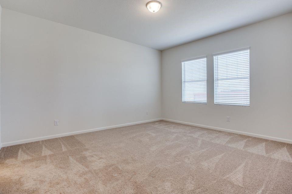 1815 Wolf Run Anna, TX 75409 - Photo 9 of 11 an empty room with windows
