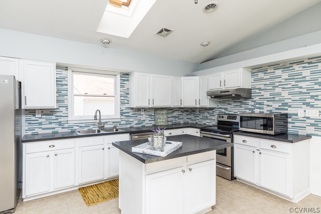 1471 Robindale Road Richmond, VA 23235 - Photo 4 of 32 Open Kitchen with Stainless, Tile Floor, Tile Back