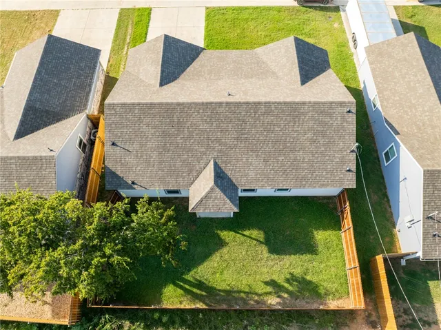 an aerial view of a house having swimming pool