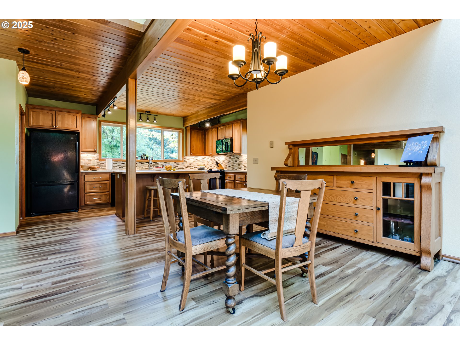 90498 Sunderman Road Springfield, OR 97478 - Photo 14 of 47 a dining room with furniture and wooden floor