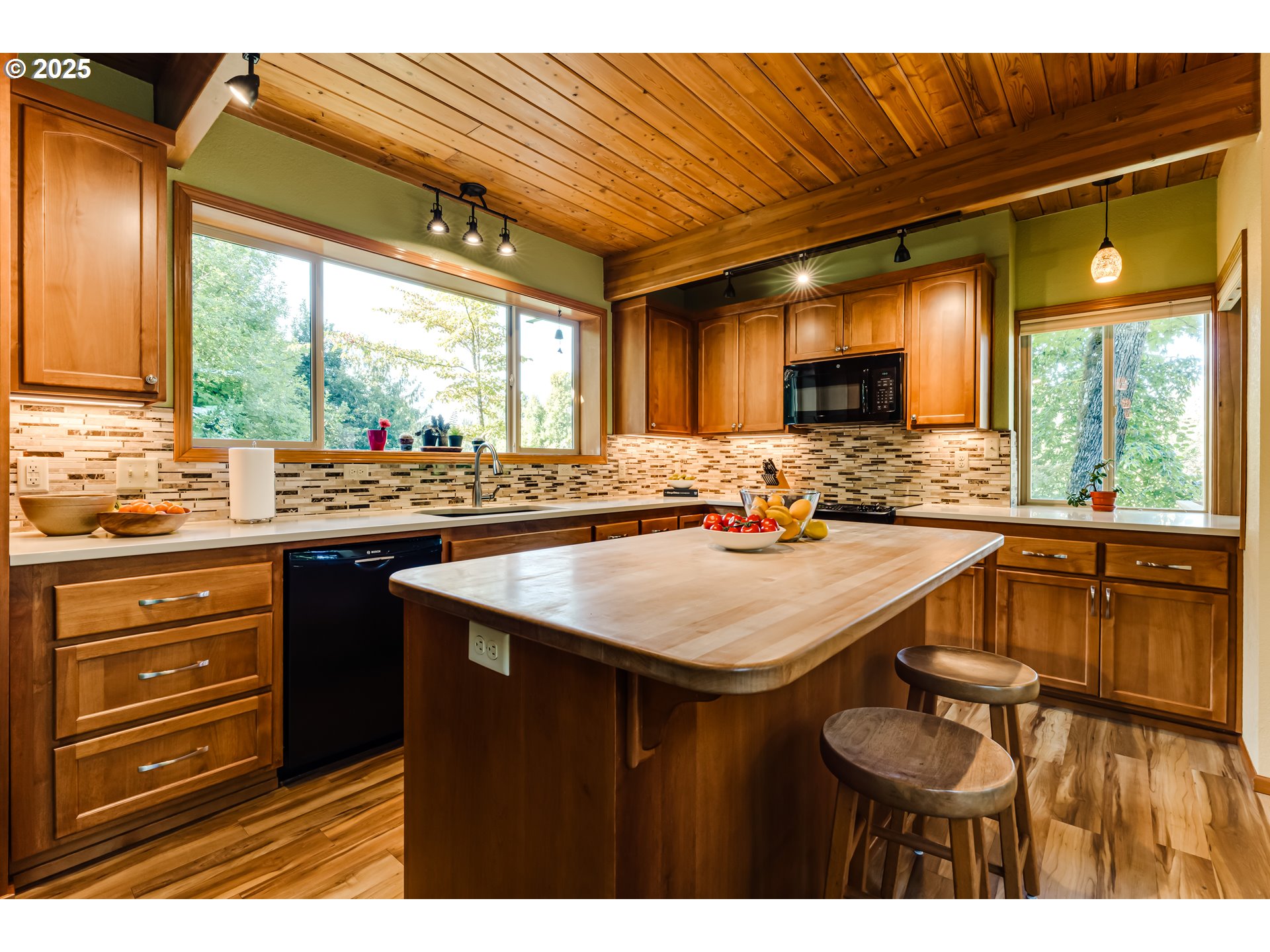 90498 Sunderman Road Springfield, OR 97478 - Photo 17 of 47 a kitchen with a sink a stove and a refrigerator