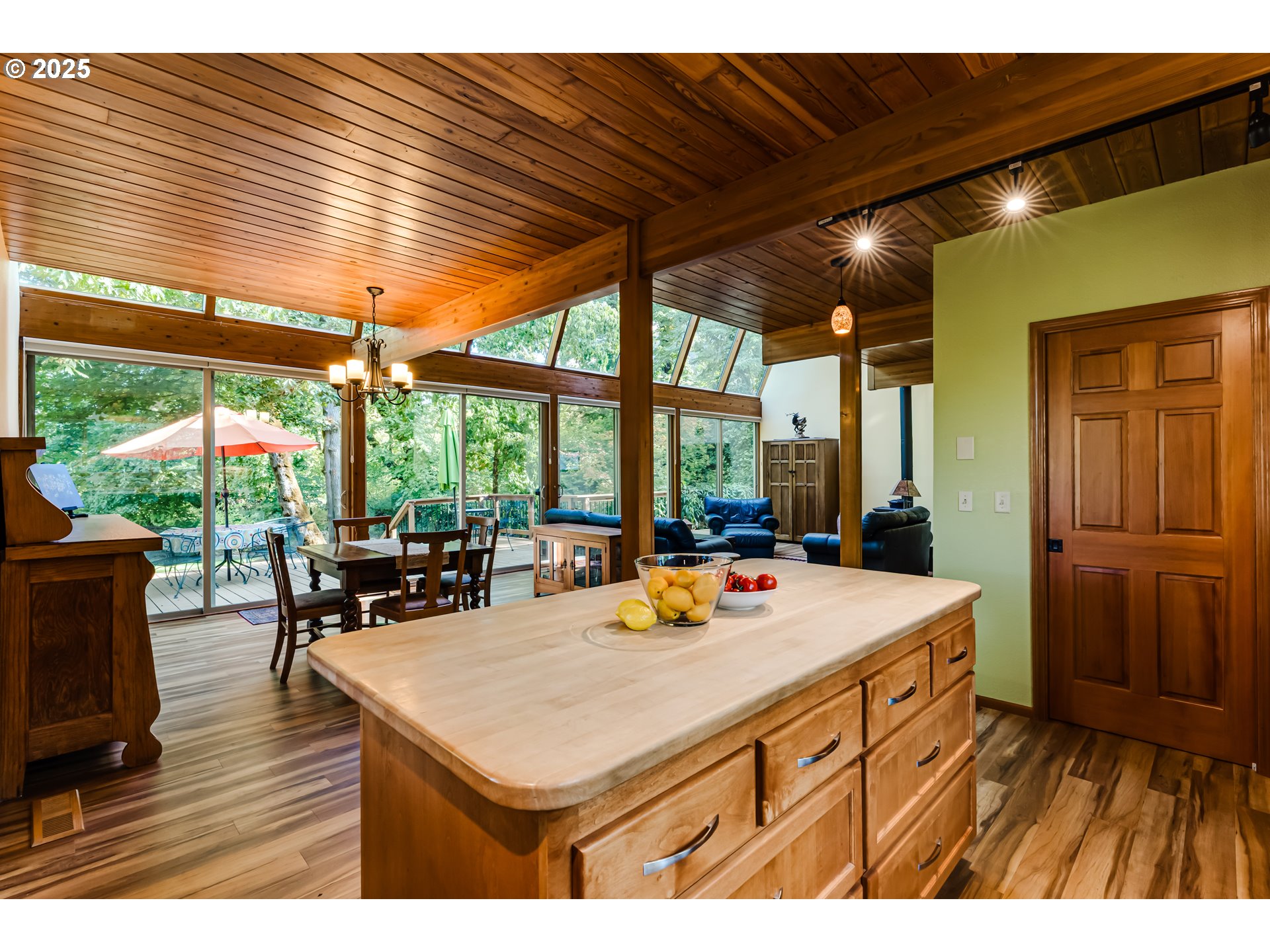 90498 Sunderman Road Springfield, OR 97478 - Photo 19 of 47 a view of a dining room with furniture window and wooden floor