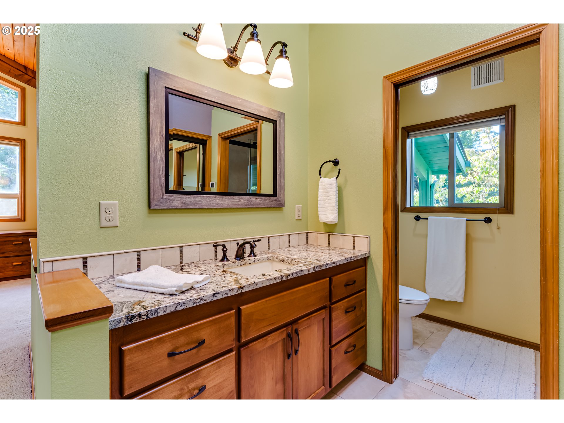 90498 Sunderman Road Springfield, OR 97478 - Photo 26 of 47 a bathroom with a sink and a mirror