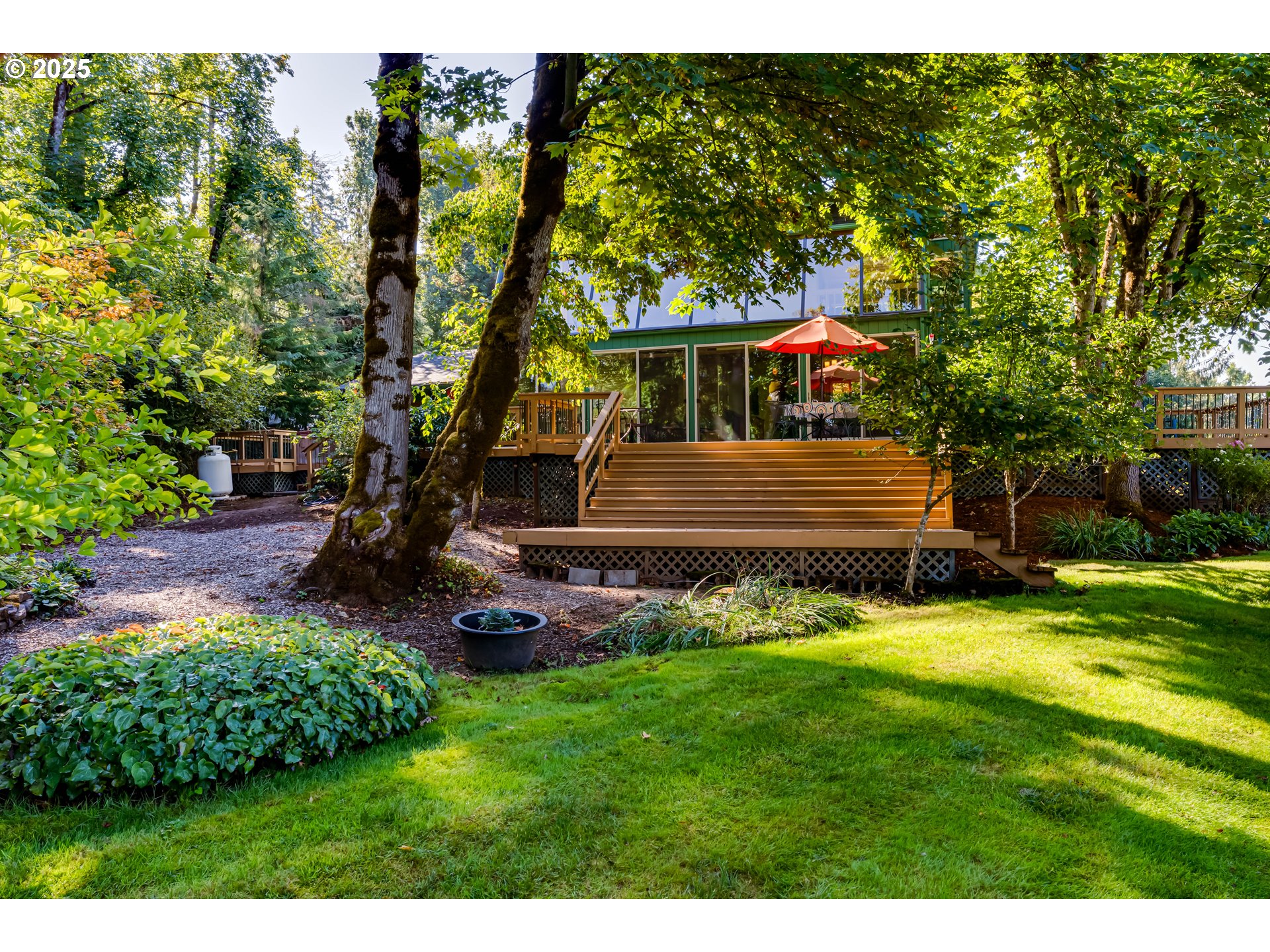 90498 Sunderman Road Springfield, OR 97478 - Photo 41 of 47 a front view of a house with a garden