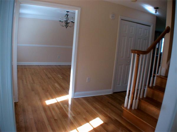 30 Corbin Road Dudley, MA 01571 - Photo 3 of 9 a view of walk in closet with wooden floor
