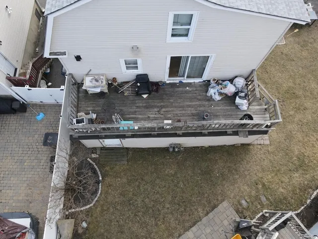 a view of a hallway and wooden floor