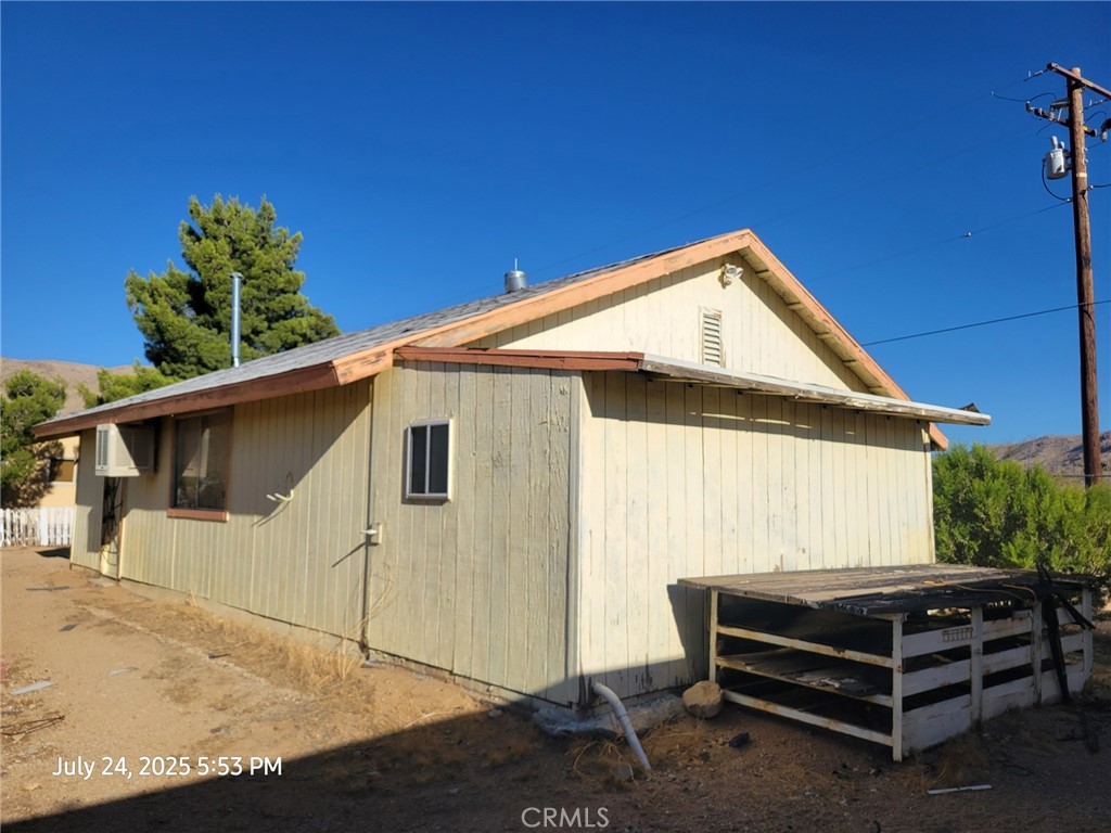 27177 Cahuilla Road Apple Valley, CA 92307 - Photo 53 of 75 a front view of a house with a yard
