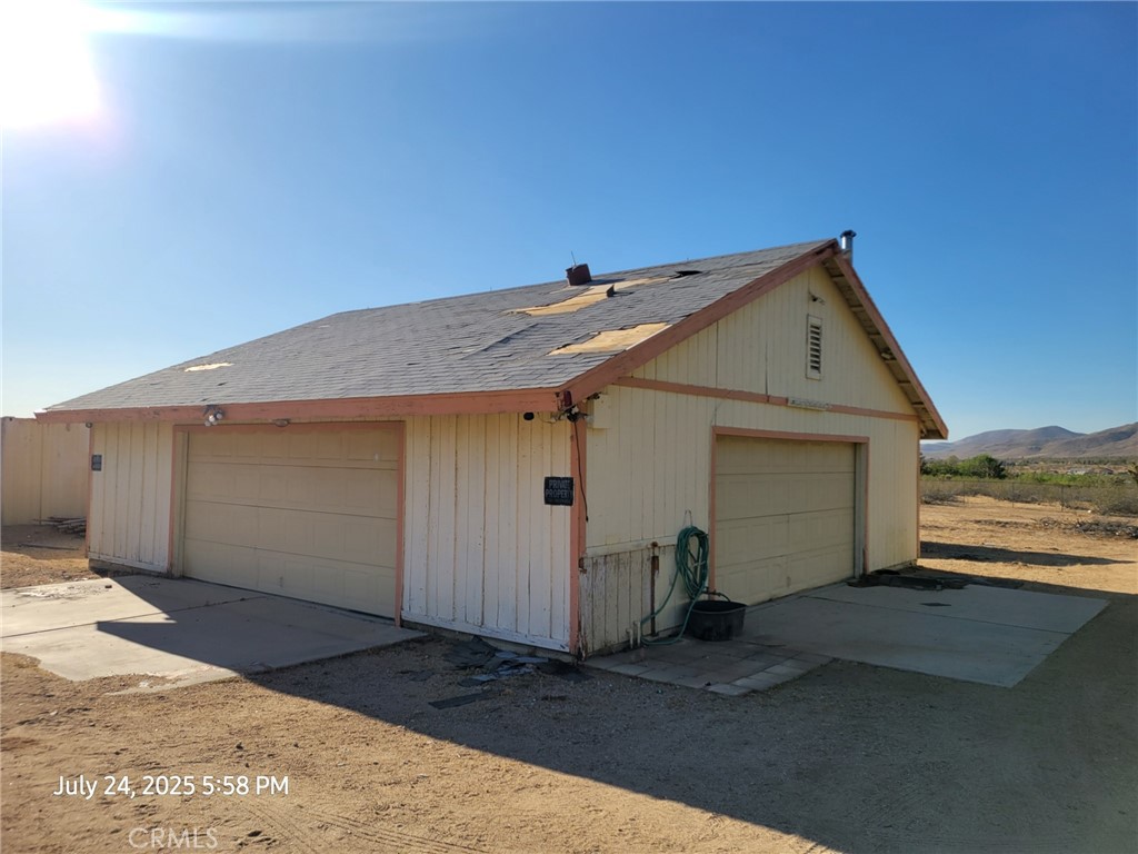 27177 Cahuilla Road Apple Valley, CA 92307 - Photo 54 of 75 a view of a house with a outdoor space