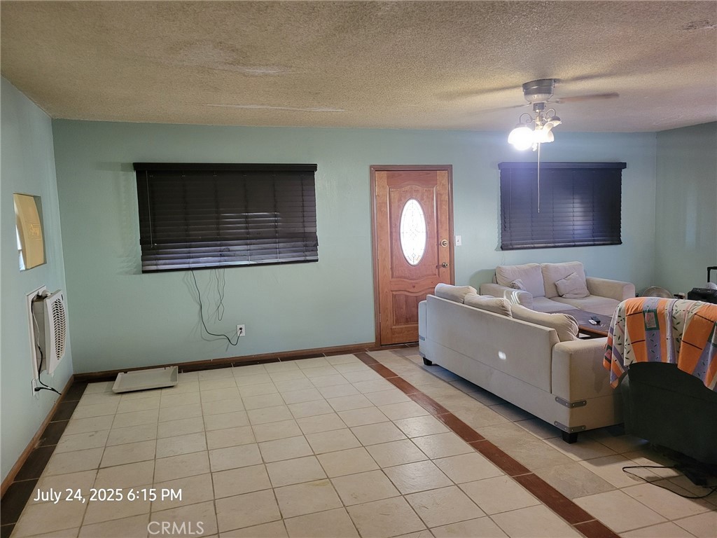 27177 Cahuilla Road Apple Valley, CA 92307 - Photo 63 of 75 a bathroom with a sink mirror and vanity