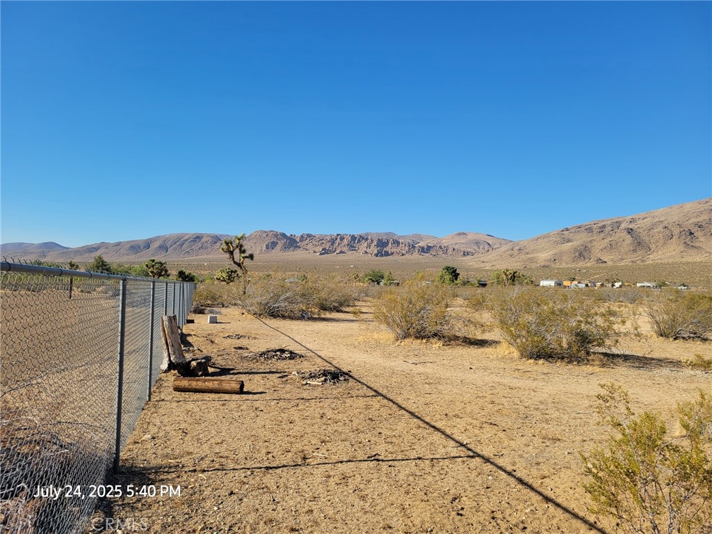 27177 Cahuilla Road Apple Valley, CA 92307 - Photo 8 of 75 a view of a road with an ocean view