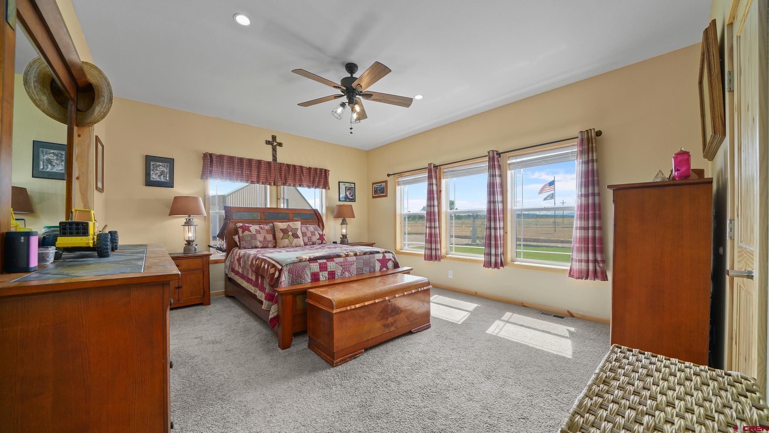 37105 II Road Redvale, CO 81431 - Photo 19 of 38 a bedroom with furniture and a window