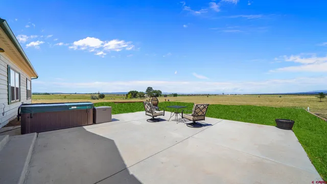 a view of a terrace with a garden