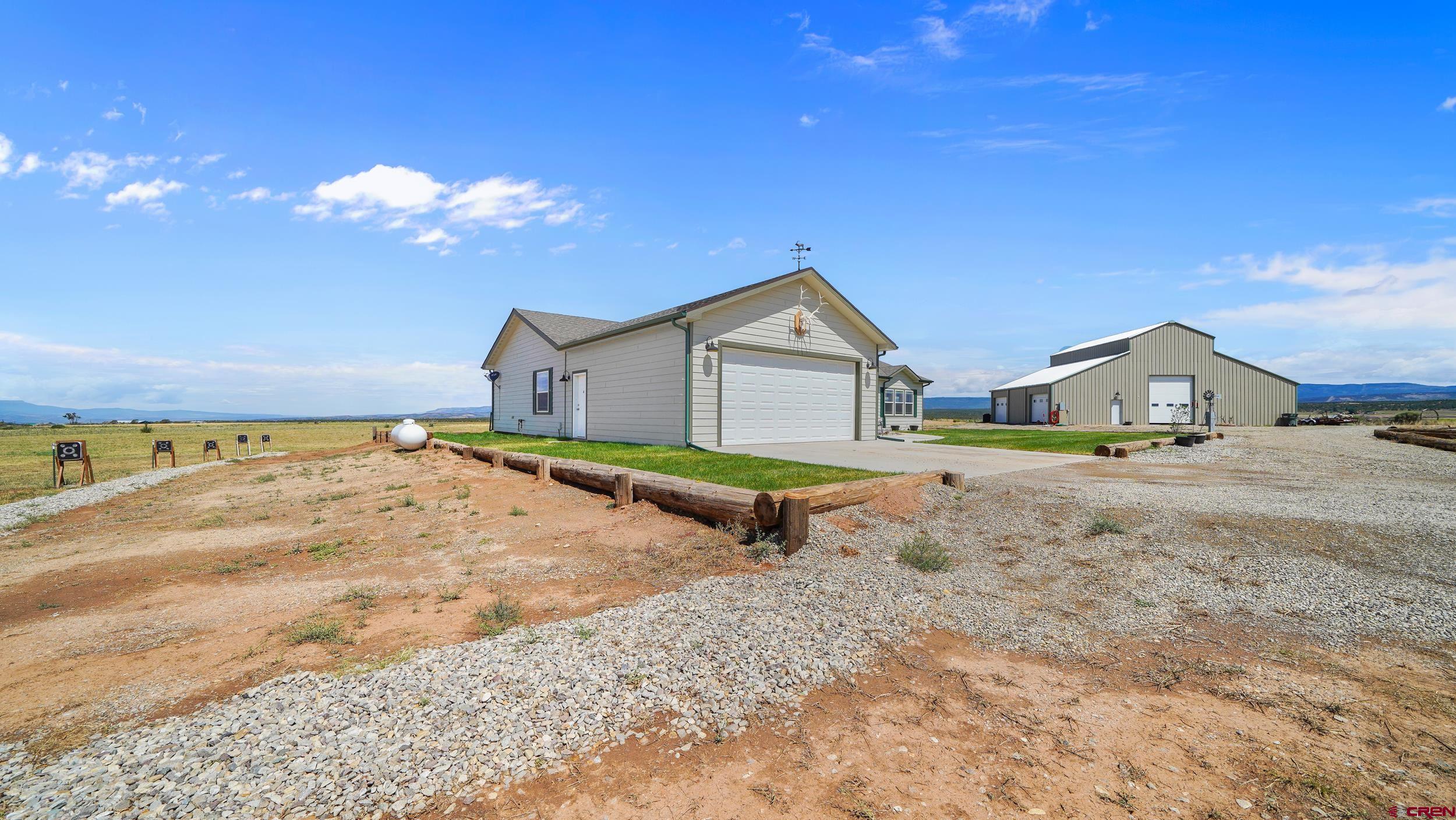 37105 II Road Redvale, CO 81431 - Photo 4 of 38 a house with a yard