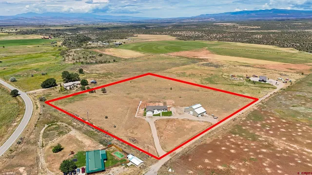 a view of a pool and an outdoor space
