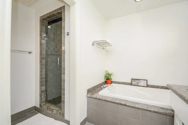 a bathroom with a sink and a shower