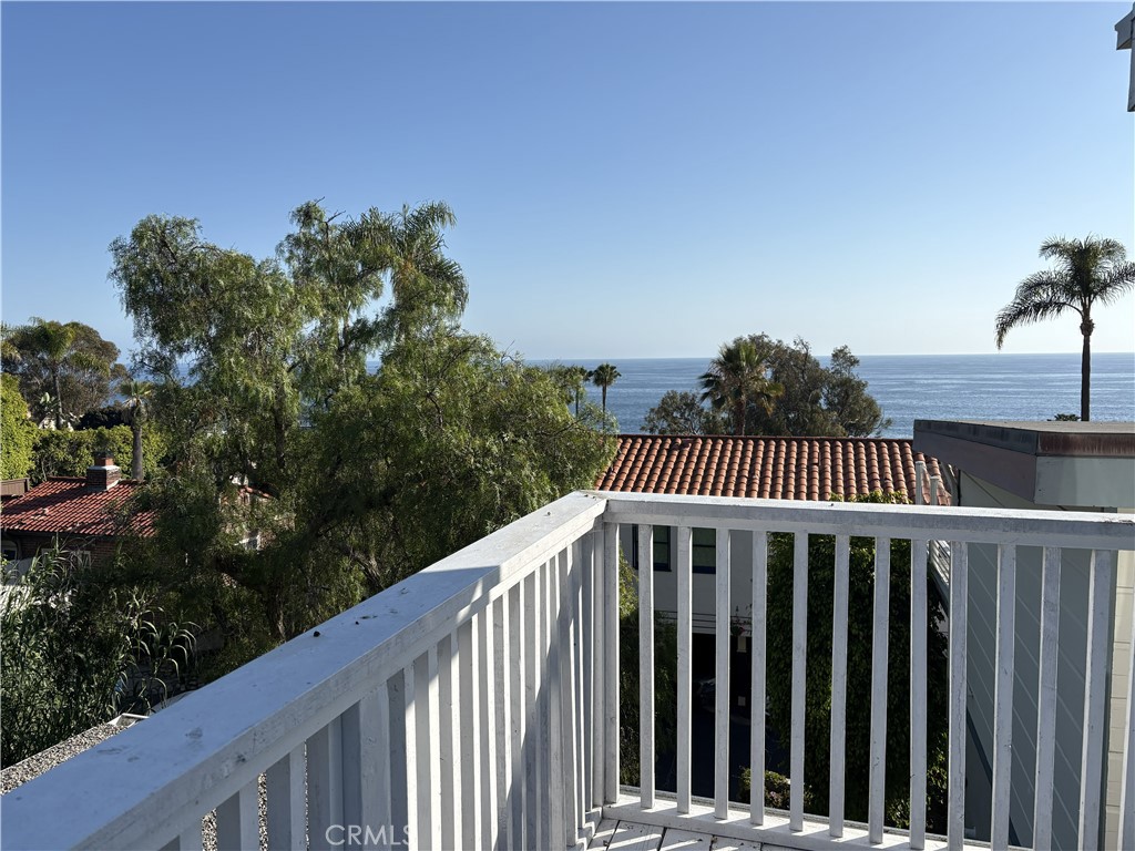 263 Upland Road Laguna Beach, CA 92651 - Photo 55 of 56 a view of a balcony with wooden fence