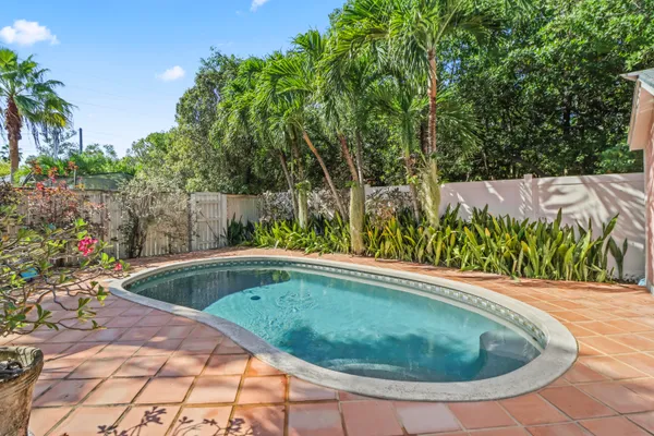 a view of a swimming pool with a patio