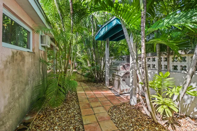 a view of yard from a corridor