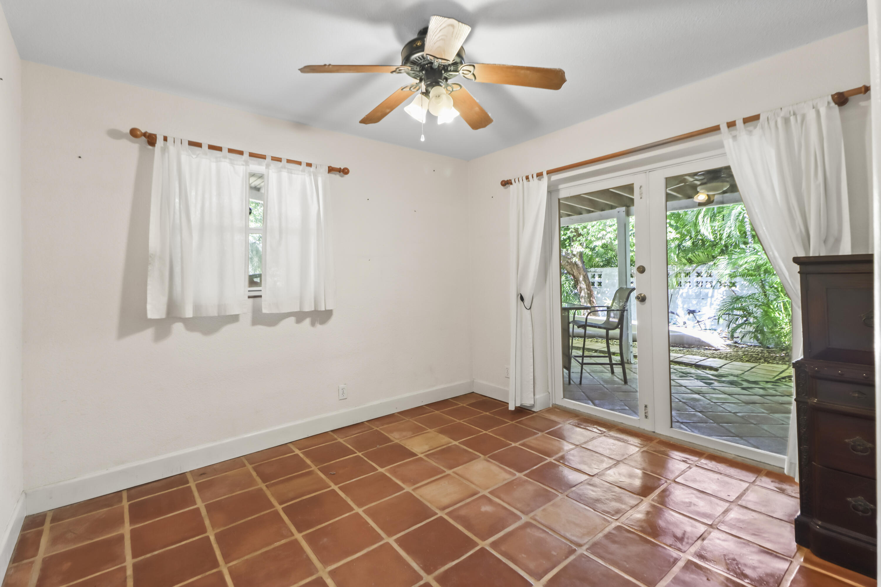 1406 Sunset Drive Key West, FL 33040 - Photo 16 of 23 a view of an empty room with a window