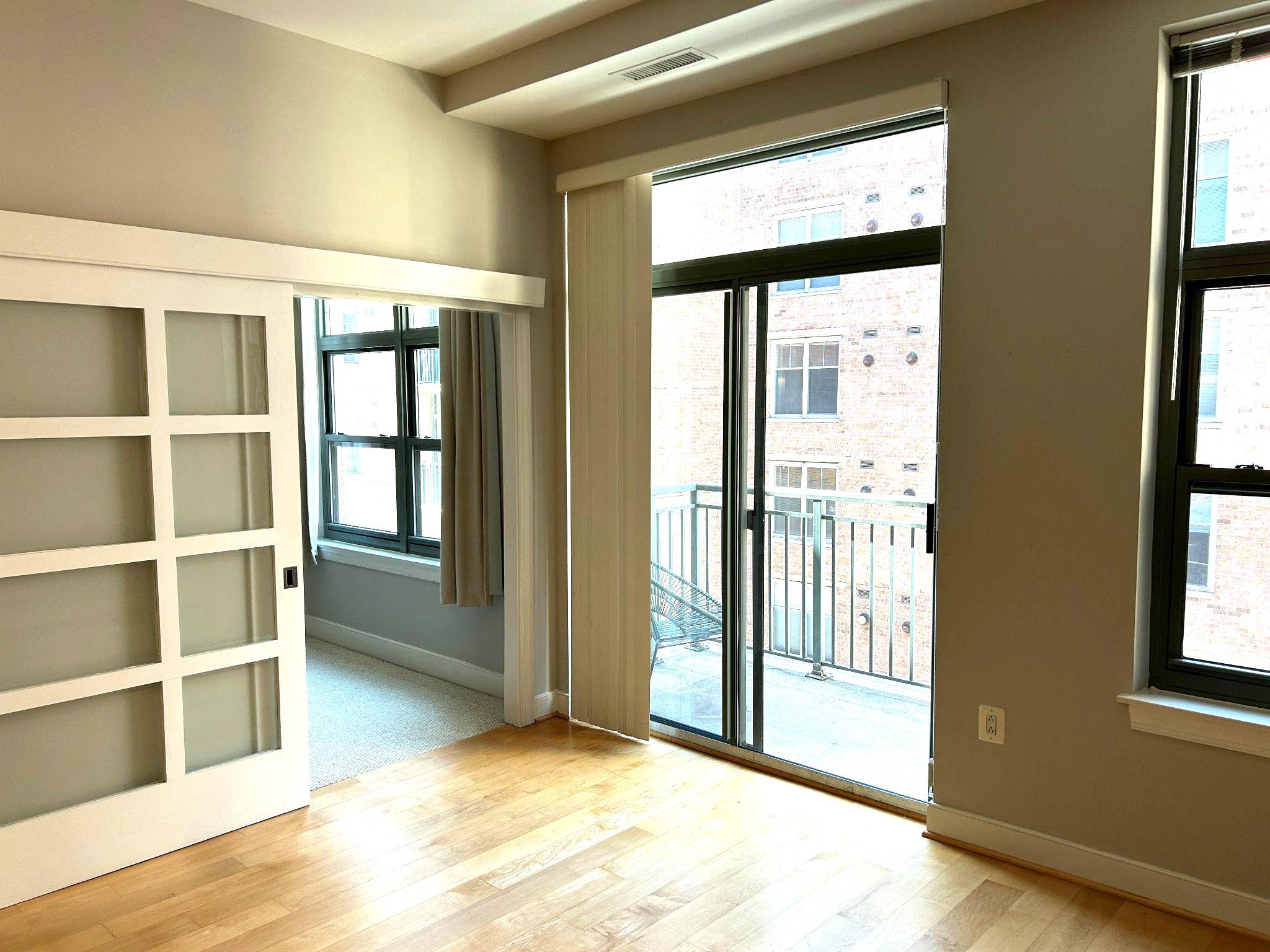 2425 L Street Northwest, Unit 421 Washington, DC 20037 - Photo 9 of 18 Doors to bedroom and balcony