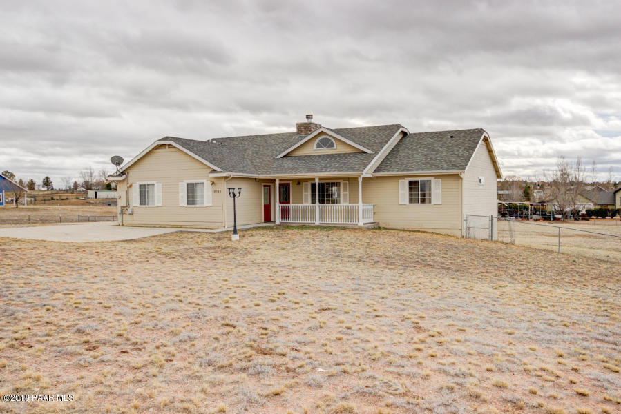 2165 West Lazy Ranch Road Chino Valley, AZ 86323 - Photo 1 of 17 a house with yard in front of it