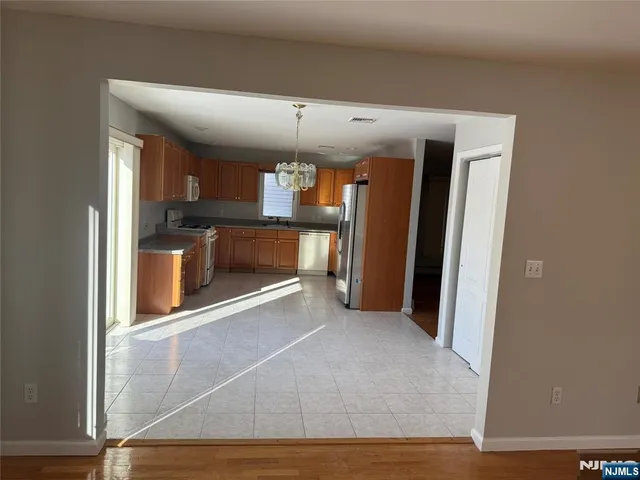 a view of a kitchen with a sink