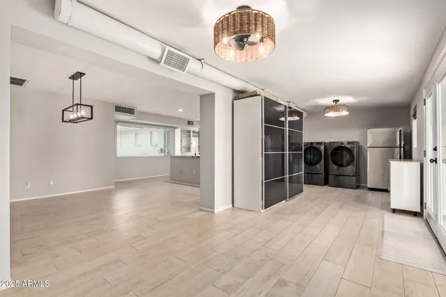 a view of an empty room with a window