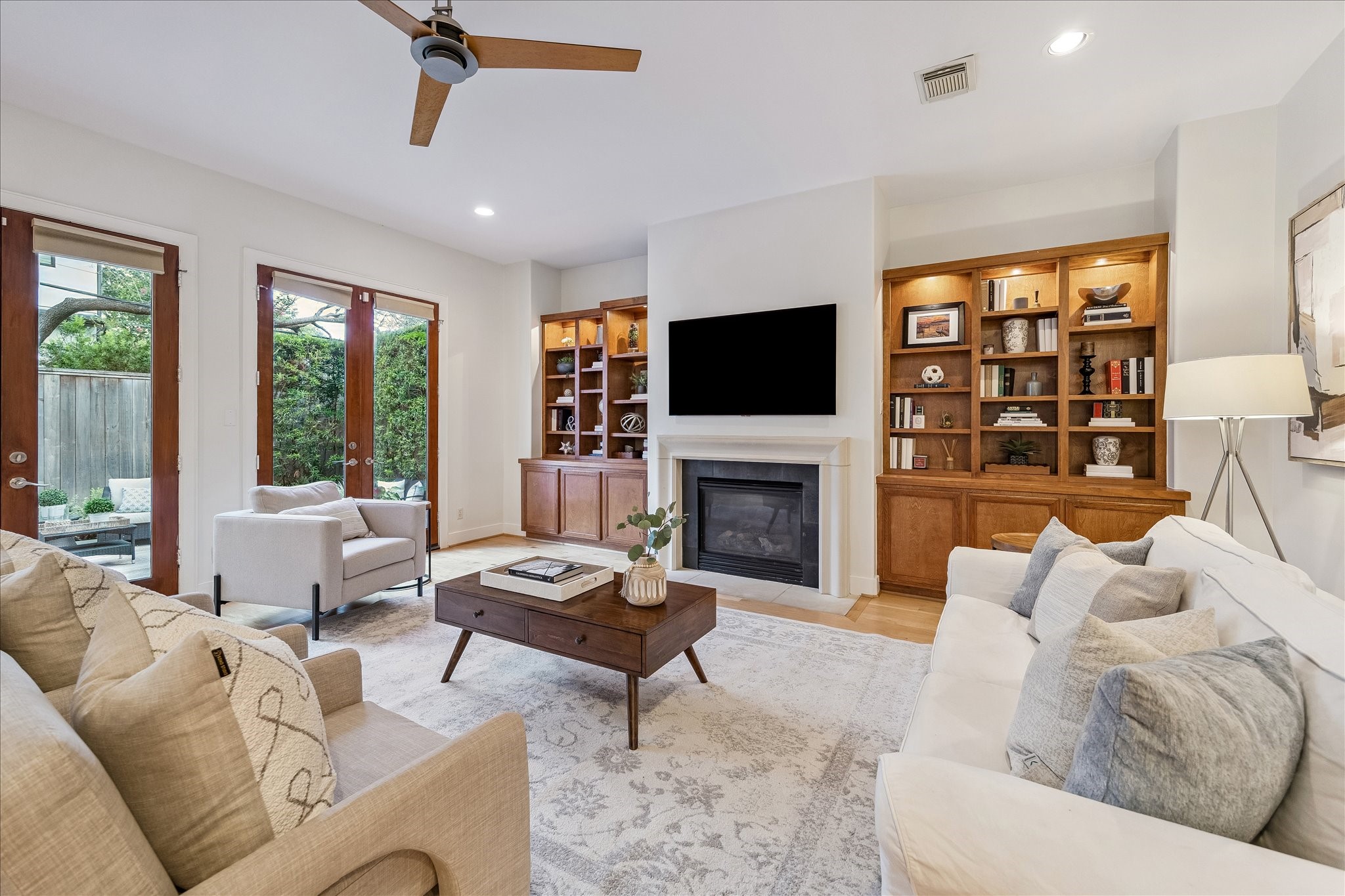 4010 Milton Street Houston, TX 77005 - Photo 14 of 49 FAMILY ROOM/DEN.
A balance of warmth, natural light, and custom craftsmanship defines the family room.