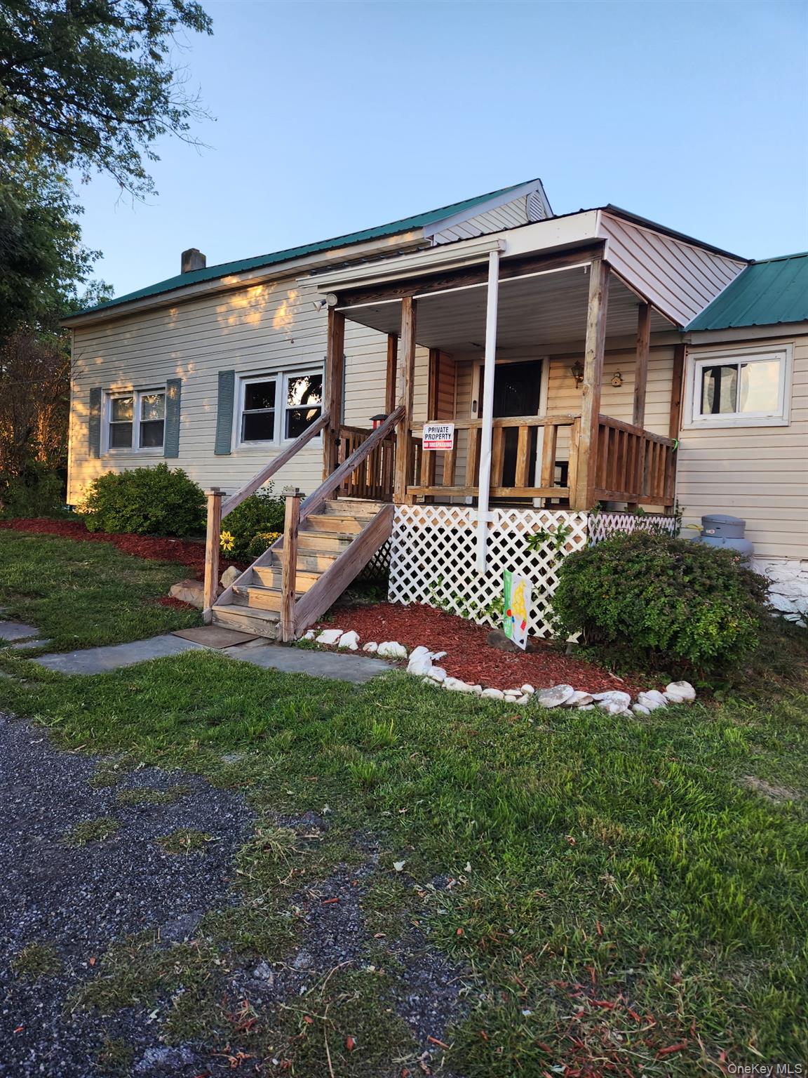 202 Ridgebury Road New Hampton, NY 10958 - Photo 1 of 1 Front view that features a covered porch.
