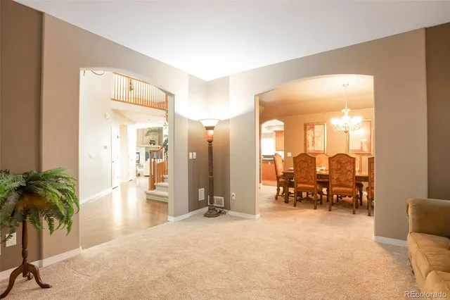 a lobby with furniture and a large window