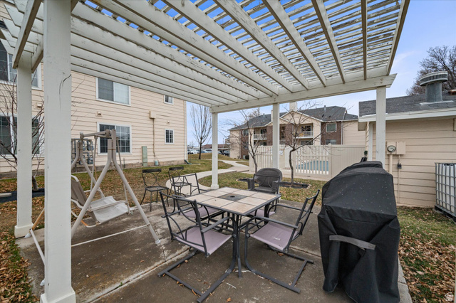 2095 South Main Street, Unit 13 Bountiful, UT 84010 - Photo 31 of 45 View of patio / terrace with a pergola, grilling area, and outdoor dining area