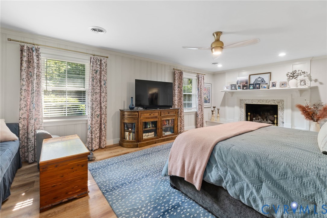 2360 Castlebridge Road Midlothian, VA 23113 - Photo 19 of 50 a spacious bedroom with a bed and a flat screen television