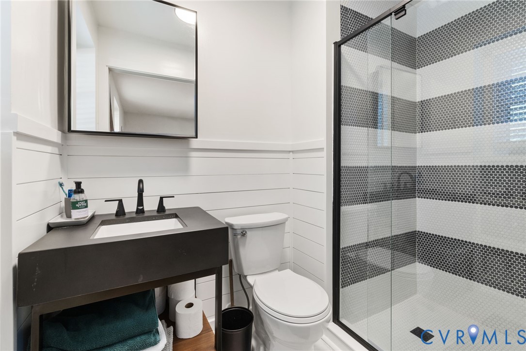 2360 Castlebridge Road Midlothian, VA 23113 - Photo 29 of 50 a bathroom with a sink toilet and shower