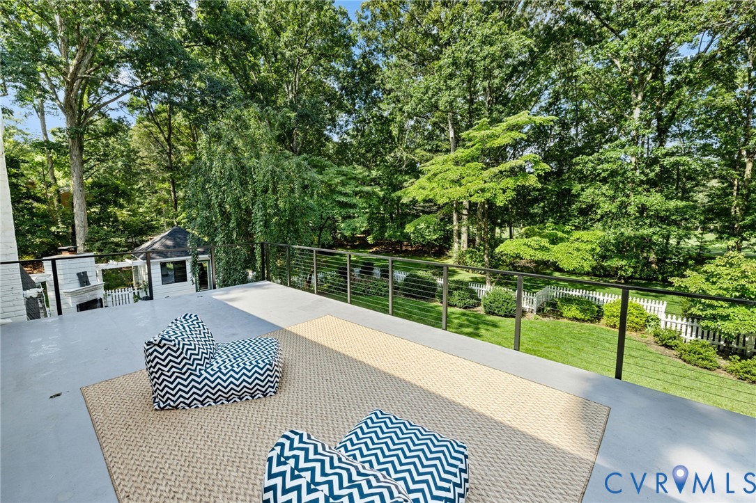 2360 Castlebridge Road Midlothian, VA 23113 - Photo 36 of 50 a view of a deck with a floor to ceiling window next to a yard