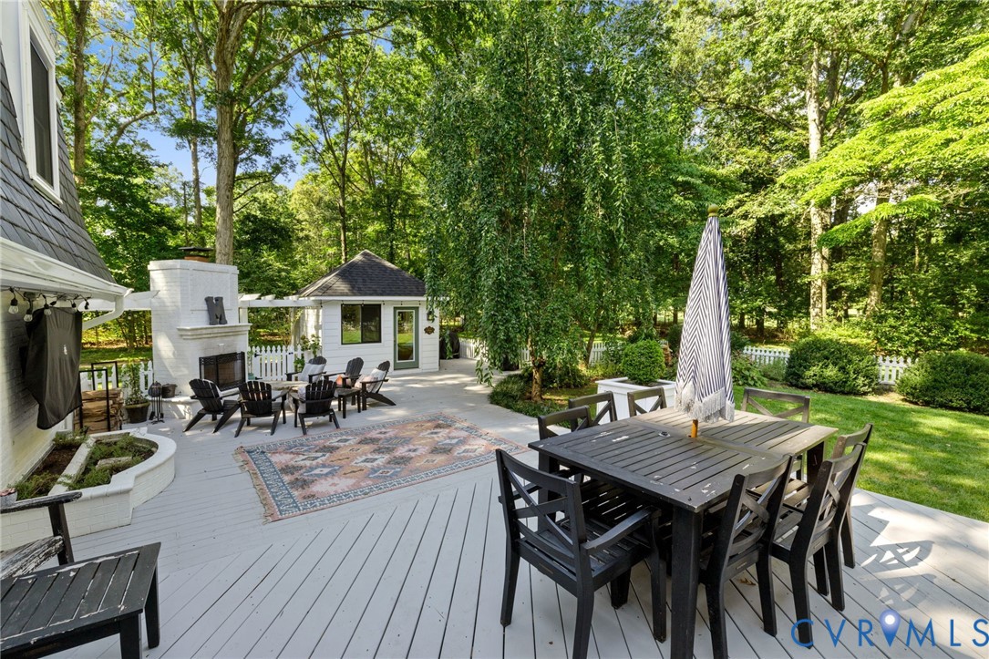 2360 Castlebridge Road Midlothian, VA 23113 - Photo 37 of 50 a view of a dinning table and chairs in the patio