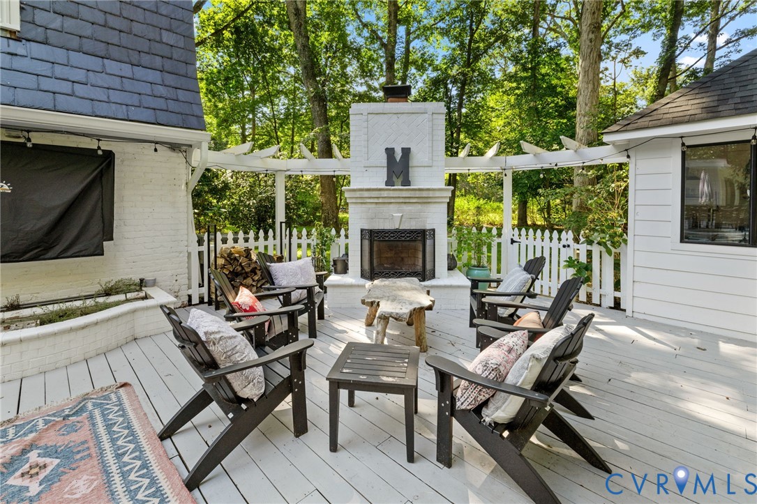 2360 Castlebridge Road Midlothian, VA 23113 - Photo 38 of 50 a view of a patio with couches table and chairs and potted plants
