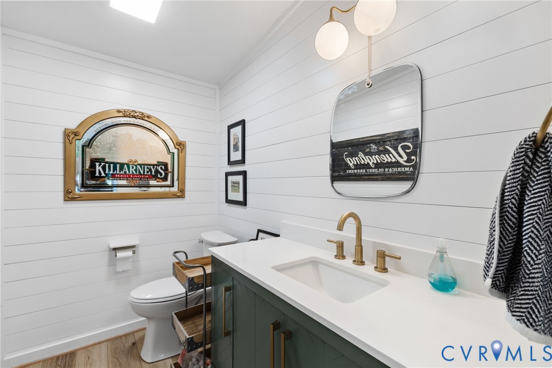 2360 Castlebridge Road Midlothian, VA 23113 - Photo 42 of 50 a bathroom with a sink a mirror and a toilet