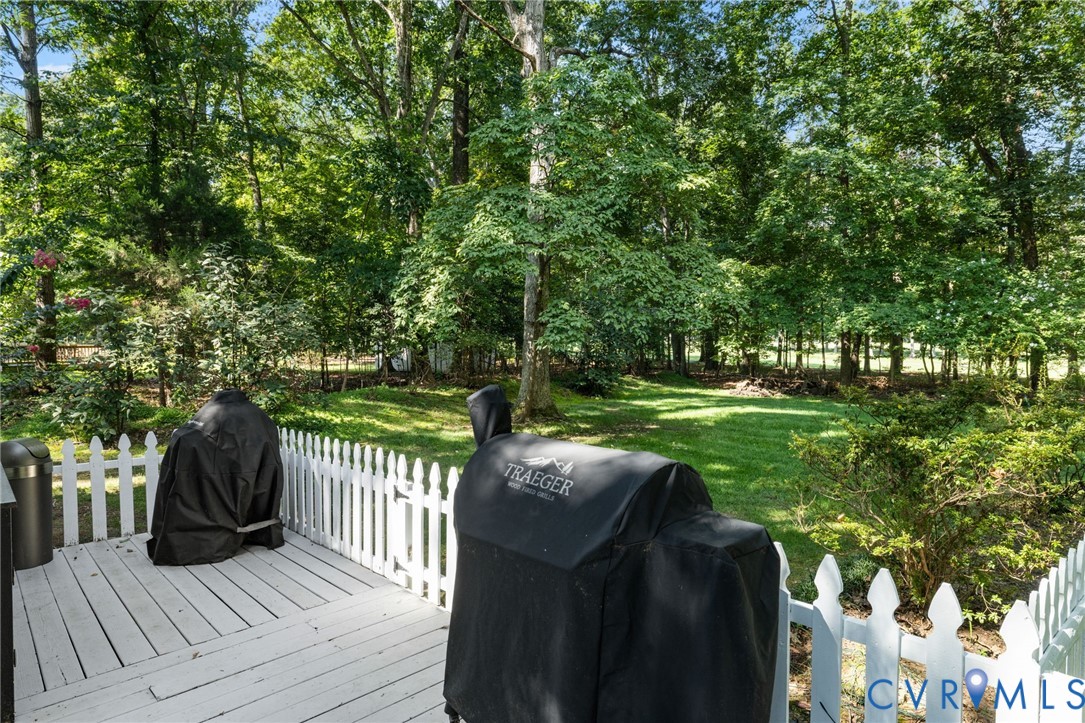 2360 Castlebridge Road Midlothian, VA 23113 - Photo 43 of 50 a view of a deck with a yard