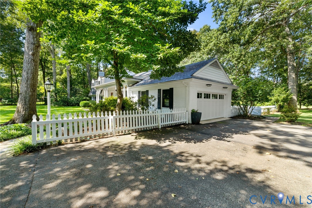 2360 Castlebridge Road Midlothian, VA 23113 - Photo 49 of 50 a view of a house with a small yard and a large tree