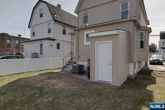 a view of a house with a large window