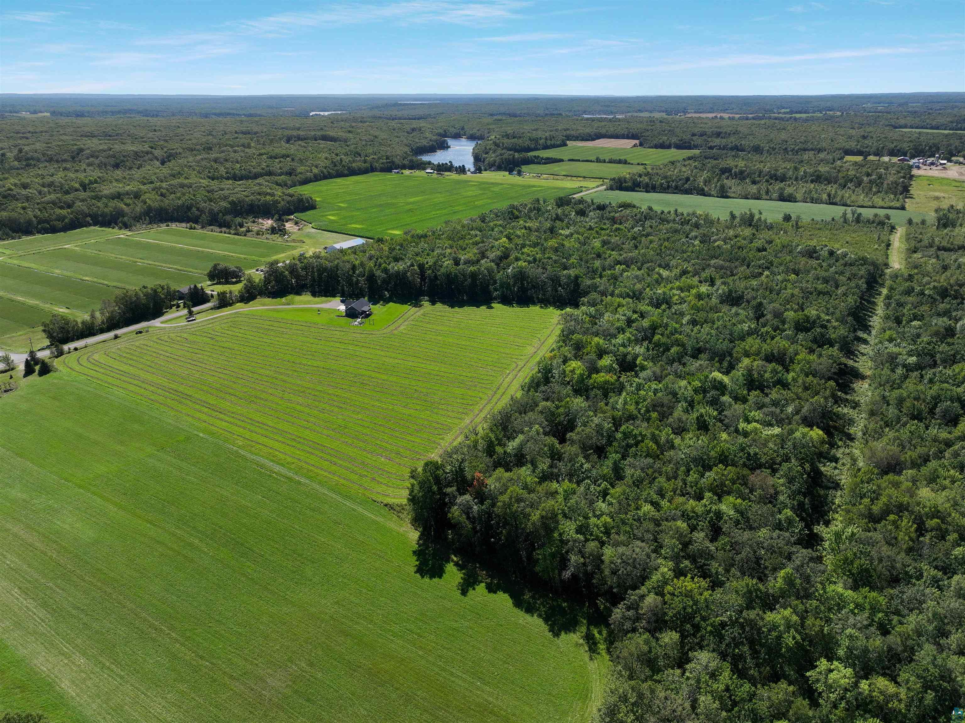 N3685 Fenander Road Spooner, WI 54801 - Photo 12 of 38 Birds eye view of property with a rural view and a water view