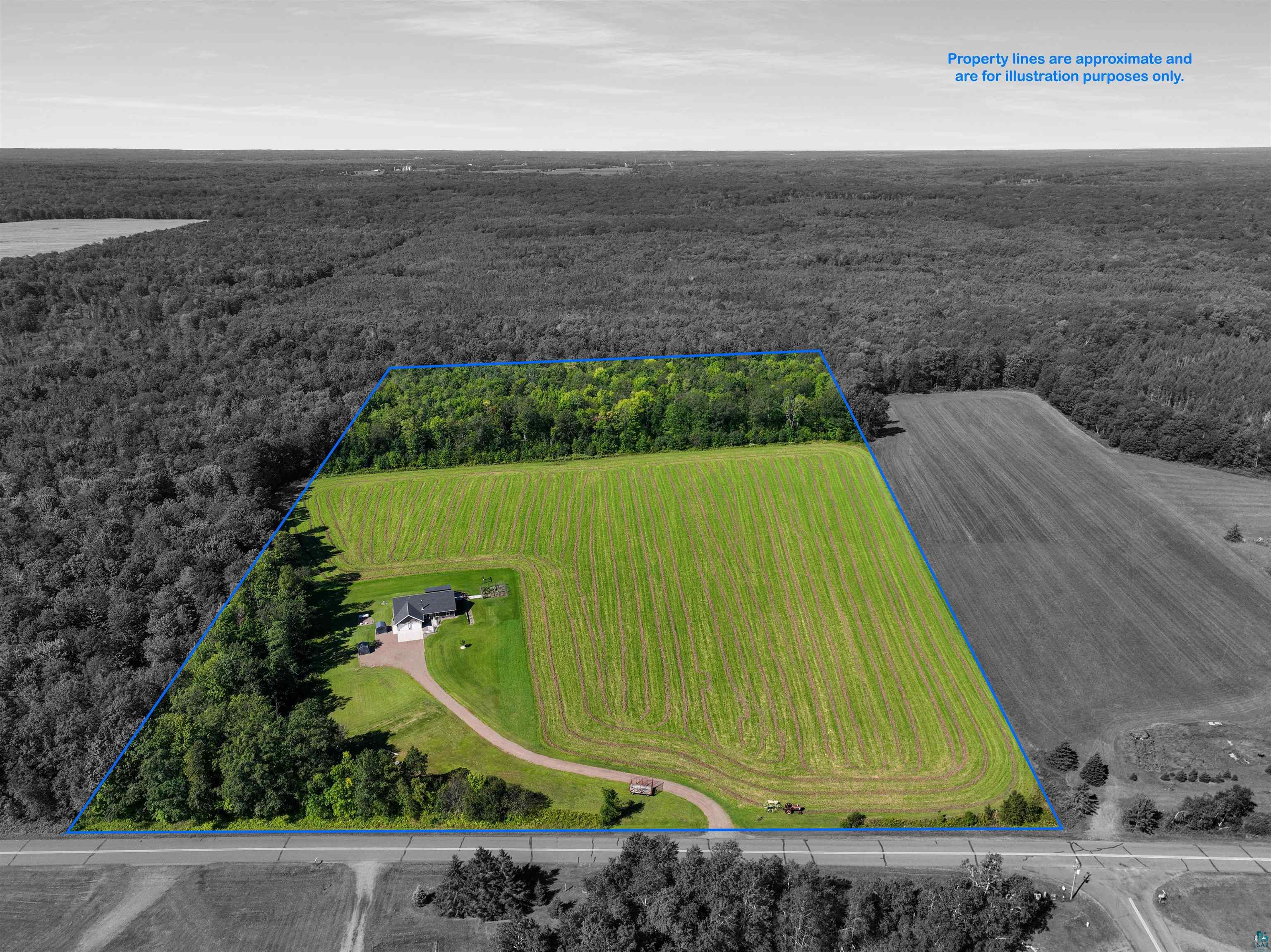 N3685 Fenander Road Spooner, WI 54801 - Photo 2 of 38 Birds eye view of property featuring a rural view
