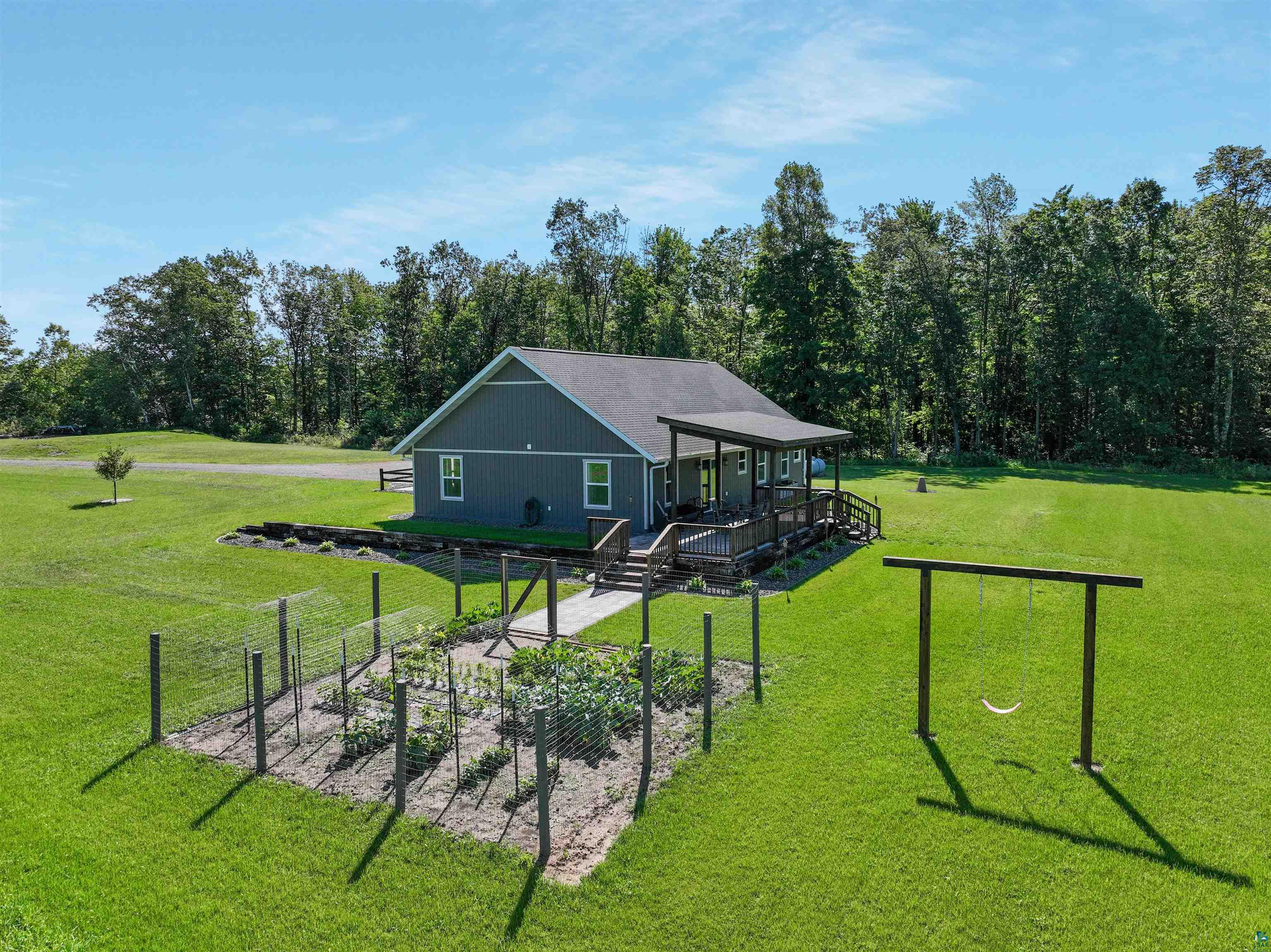 N3685 Fenander Road Spooner, WI 54801 - Photo 6 of 38 View of yard