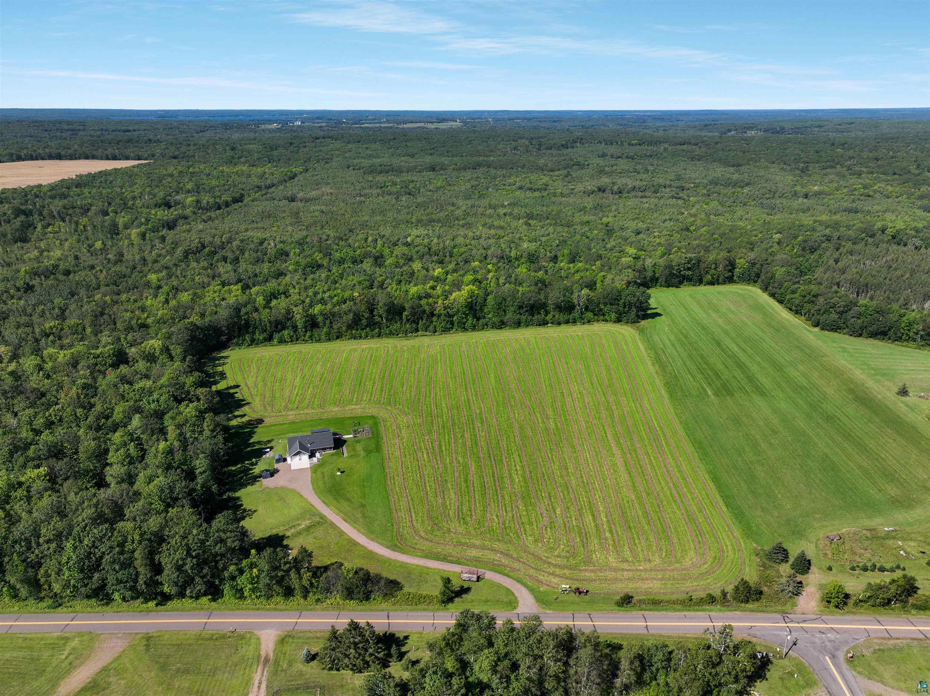 N3685 Fenander Road Spooner, WI 54801 - Photo 9 of 38 Drone / aerial view with a rural view
