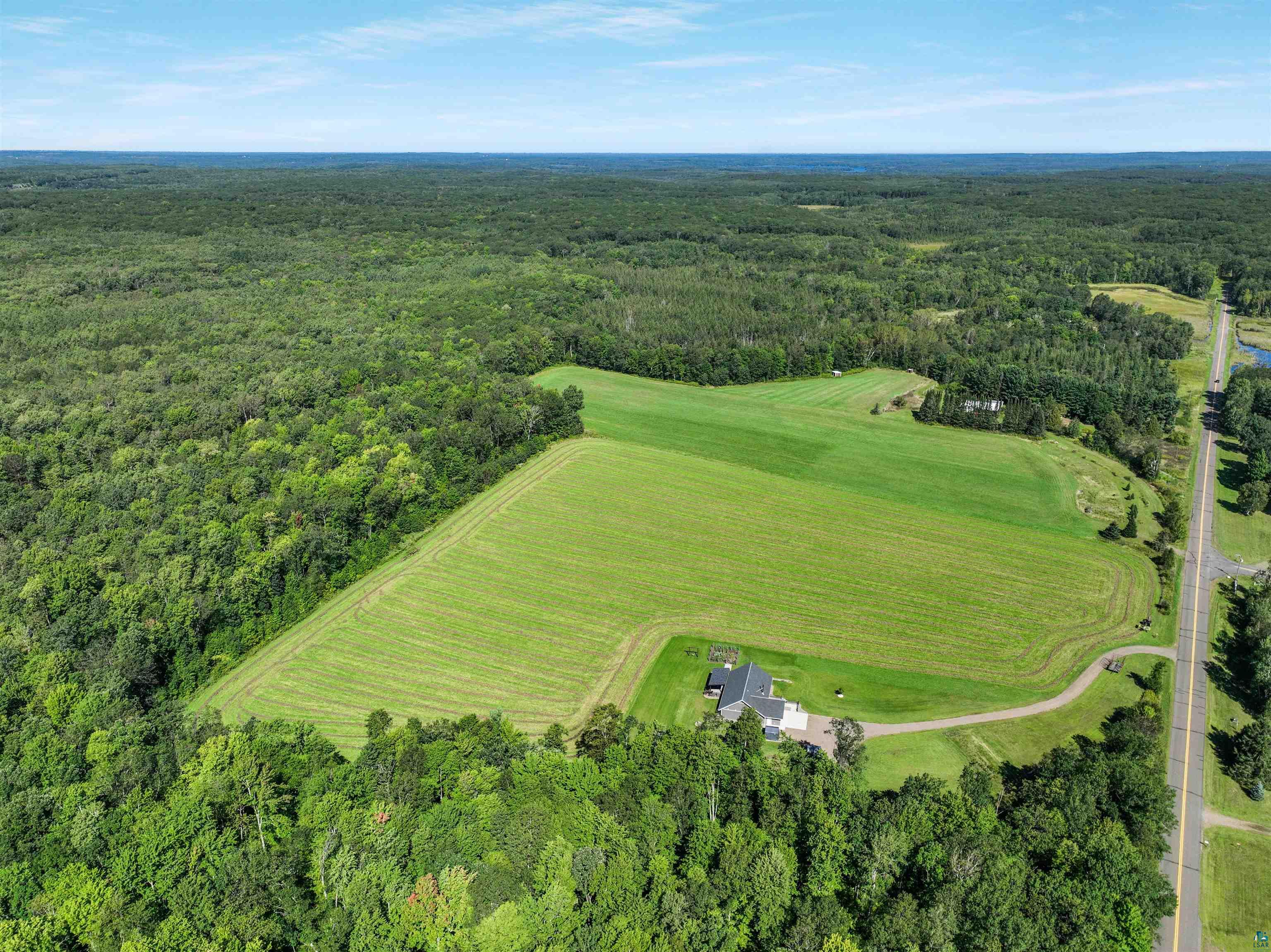 N3685 Fenander Road Spooner, WI 54801 - Photo 10 of 38 Aerial view featuring a rural view