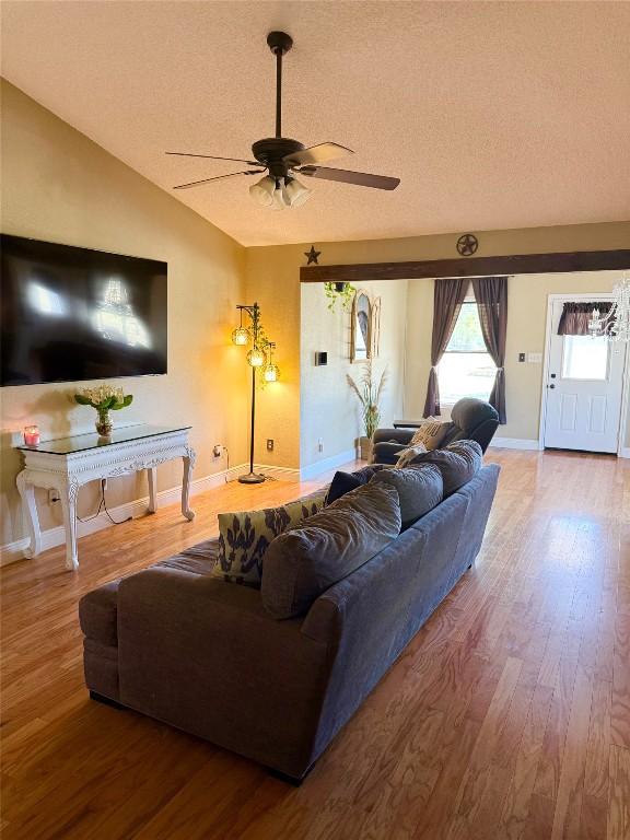 211 Rabbit Hollow Lane Georgetown, TX 78626 - Photo 14 of 34 a living room with furniture and a flat screen tv